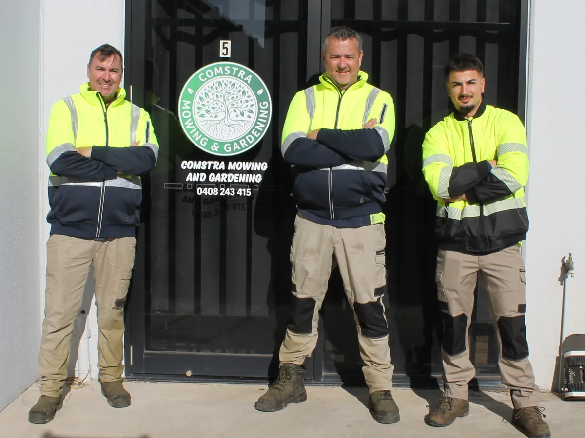 COMSTRA Mowing gardening team standing together outside the Derrimut office